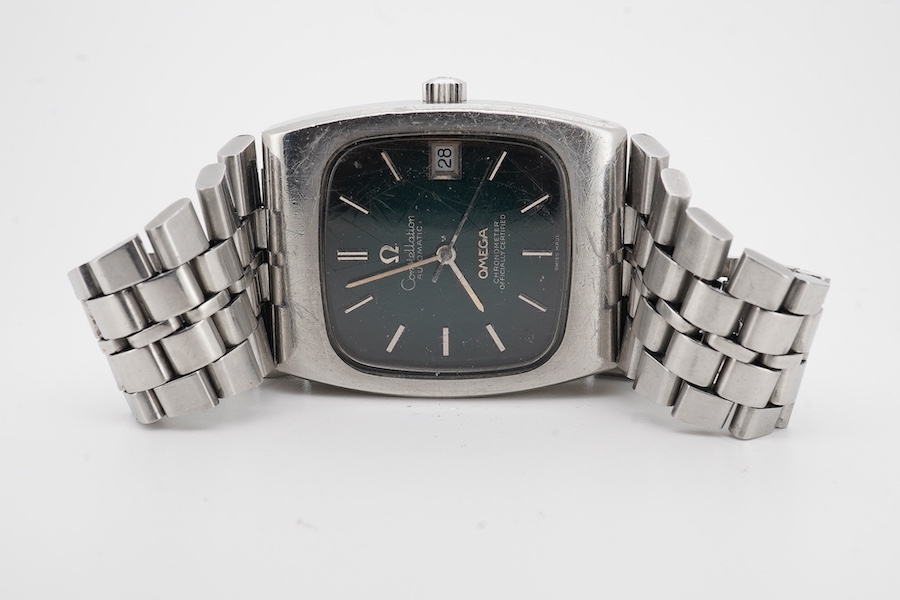 A gentleman's 1970;s stainless steel Omega Constellation automatic wrist watch, with baton numerals and date aperture, case diameter 34mm, on a stainless steel Omega bracelet, no box or papers.